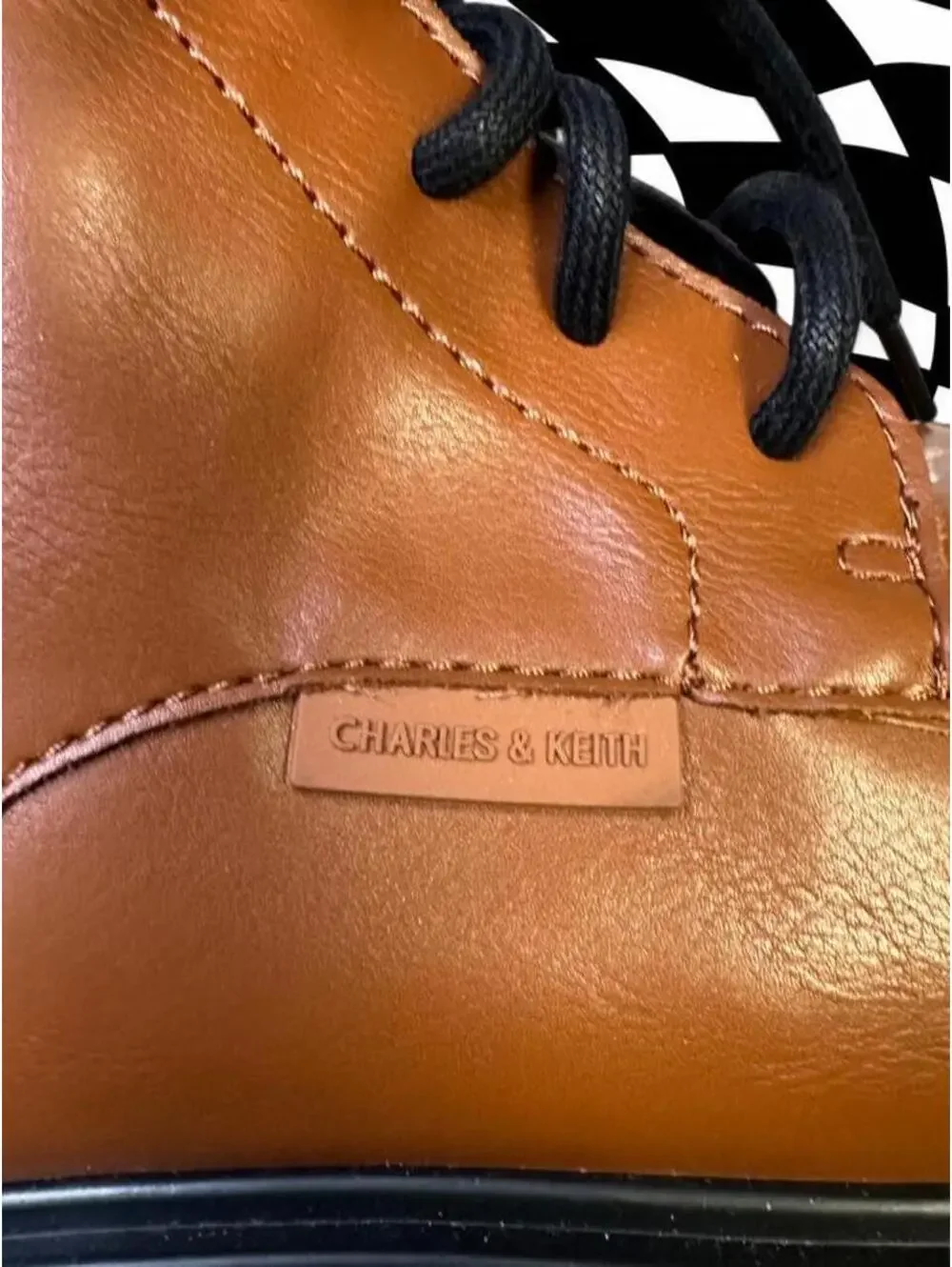 Charles & Keith Brown leather ankle boots with chunky sole and lace-up design